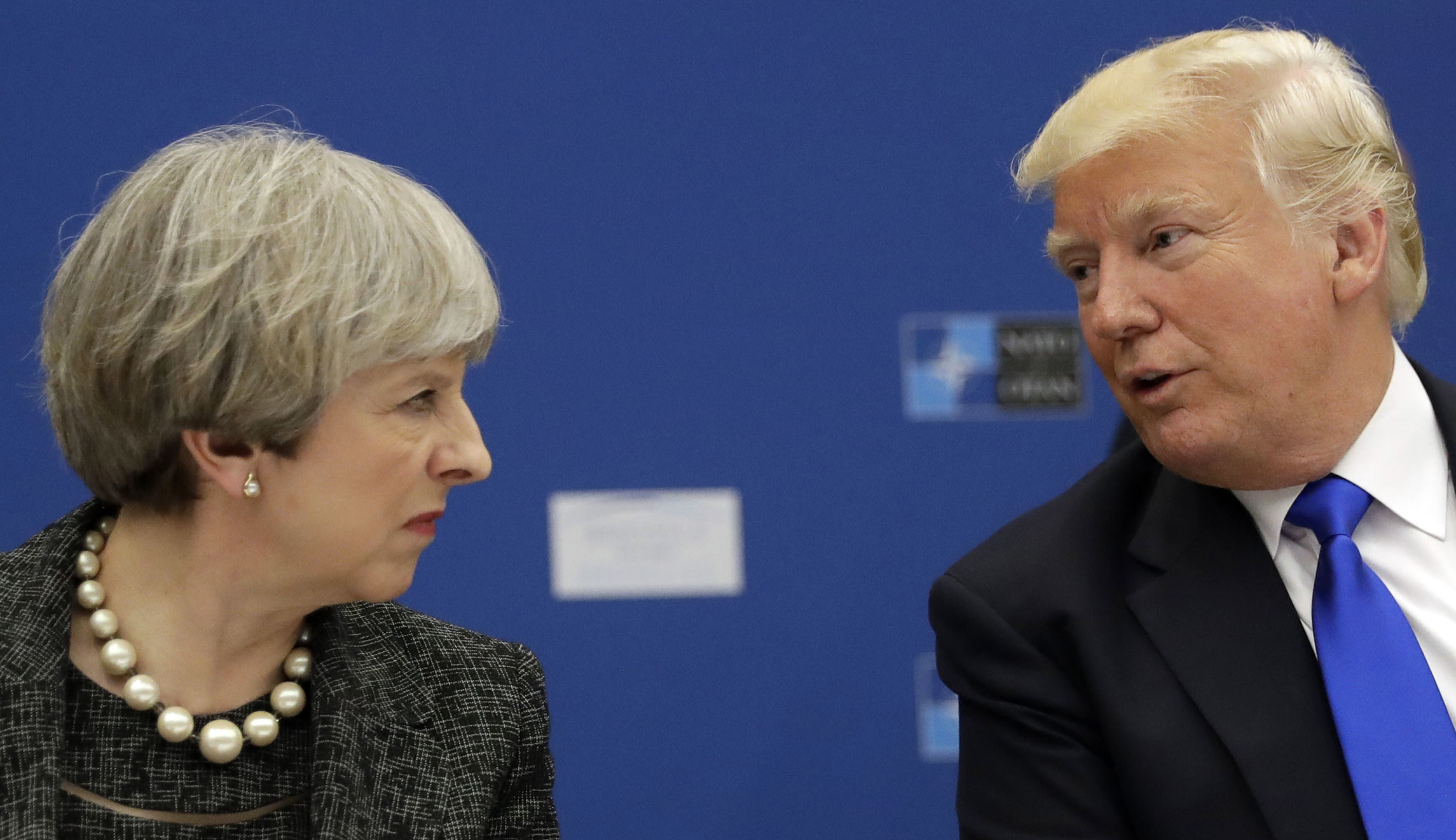 Theresa May wants Trump ‘to find a way to come back’ to Paris deal