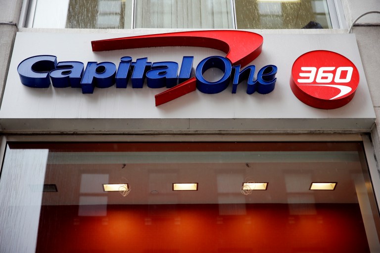 FILE - In this Jan. 14, 2014, file photo, a Capital One sign is displayed in Philadelphia. Capital One Financial Corp. reports quarterly financial results after the market close on Wednesday, April 16, 2014. (AP Photo/Matt Rourke, File)