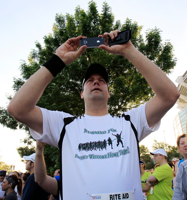  In this Sunday, May 20, 2012 photo, Congressman Tim Ryan takes a photo before running in the Cleveland Marathon, in Cleveland. In whatâs become a daily ritual, Ryan finds a quiet spot, closes his eyes, clears his mind and tries to tap into the eternal calm. Increasingly, people in settings beyond the serene yoga studio or contemplative nature path are engaging in the practice of mindfulness, a mental technique that dwells on breathing, periods of silence and concentration to keep oneâs thoughts in the present moment. (AP Photo/Tony Dejak)  