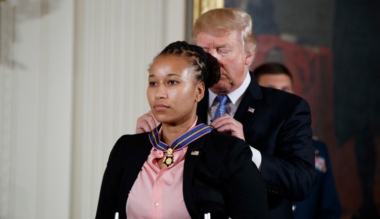 Officer Crystal Griner and David Bailey of the United States Capitol Police and Alexandria Police Officers Nicole Battaglia, Alexander Jensen, and Kevin Jobe received awards. (AP Photo/Evan Vucci)