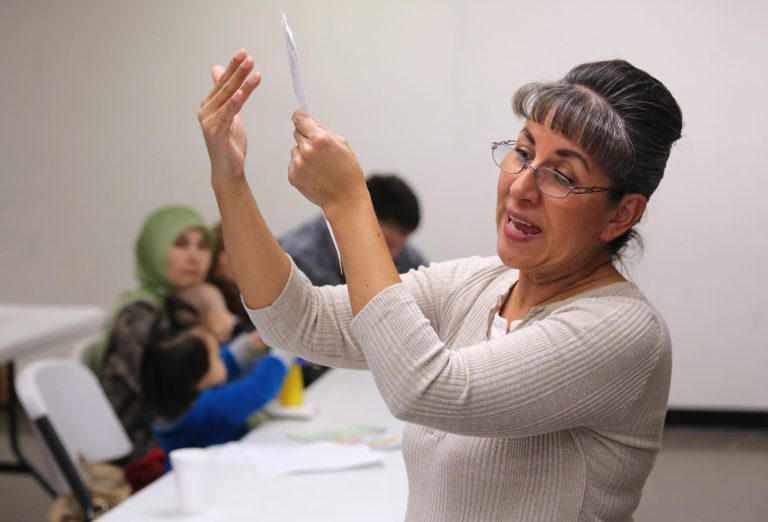 PHOENIX, AZ - MARCH 01: Recently-arrived refugees learn how to receive food stamps during a class held by the Arizona Department of Economic Security at the International Rescue Committee (IRC), office on March 1, 2013 in Phoenix, Arizona. IRC programs like many programs that receive federal funding, may be greatly cut back due to federal sequestration cuts. The IRC is a non-profit humanitarian aid organization that aids refugees and survivors of international conflict. They assist new arrivals, many of whom come from refugee camps and war zones, to adjust to American society after being granted refugee status and invited by the U.S. government to live in the United States. The IRC also assists refugees through the immigration and naturalization process to become U.S. citizens. (Photo by John Moore/Getty Images)