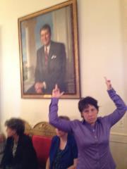 Photo: Gay activists flip the bird at WH Reagan portrait