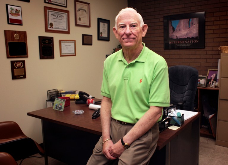 In this Sept. 3, 2014 photo, Williamson County State's Attorney Charles Garnati poses in his office in Marion, Ill., a few days before his resignation after more than 30 years in office. The Illinois Attorney Registration and Disciplinary Commission announced Monday, Sept. 15, 2014, that the Illinois Supreme Court has censured Garnati in connection with racial comments he made during a 2011 murder case. (AP Photo/The Southern, Steve Matzker)