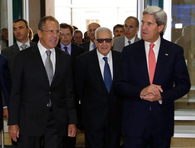 U.S. Secretary of State John Kerry, right, and Russian Foreign Minister Sergey Lavrov, left, walk with the U.N.-Arab League envoy for Syria Lakhdar Brahimi into a meeting at the United Nations offices in Geneva to discuss the ongoing problems in Syria on Friday. (AP/Larry Downing)