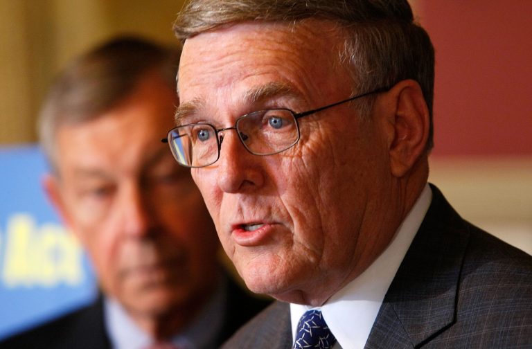 WASHINGTON - APRIL 01:  U.S. Sen. Byron Dorgan (D-ND) (R) speaks as Sen. George Voinovich (R-OH) (L) looks on during a news conference on Capitol Hill April 1, 2009 in Washington, DC. Dorgan and Voinovich introduced the 