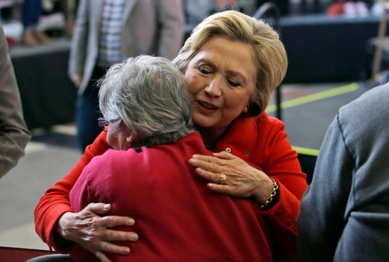Democratic presidential candidate Hillary Clinton hugs a supporter after speaking at a rally at Truckee Meadows Community College on Monday, Feb. 15, 2016, in Reno, Nev. (AP Photo/Marcio Jose Sanchez)