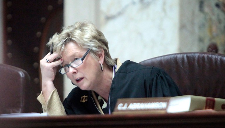 FILE - This June 6, 2011 photo shows Wisconsin Supreme Court Justice Ann Walsh Bradley listening to testimony at the Wisconsin State Capitol.