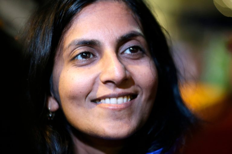 Kshama Sawant, newly elected to the Seattle city council, is interviewed before a 