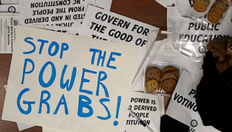 Democrats spread false rumors that Republicans would try to pack the state Supreme Court, but what they actually began doing was to pass laws that will limit the power of the incoming Democratic governor in what is already a very weak-governor state. (AP Photo/Gerry Broome)