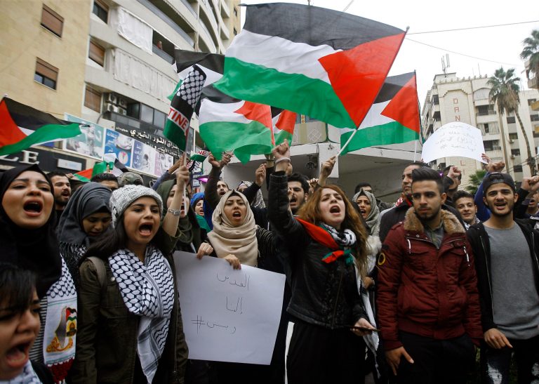 Lebanese and Palestinians students hold Palestinian flags as they take part in a protest, in the southern port city of Sidon, Lebanon, on Dec. 7. A number of U.S. allies in the Middle East are condemning the Trump administration's decision to recognize Jerusalem as the capital of Israel, with the United Arab Emirates, Kuwait, Qatar and Saudi Arabia urging Washington to reconsider and reverse the announcement. (AP Photo/Mohammed Zaatari)