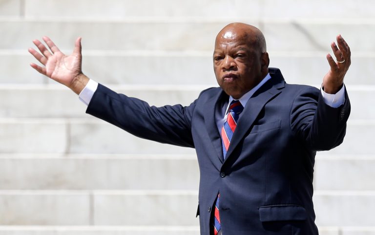 Rep. John Lewis, D-Ga., arrives to speak at a rally to commemorate the 50th anniversary of the 1963 March on Washington on the steps of the Lincoln Memorial on Saturday, Aug. 24, 2013, in Washington. Tens of thousands of people marched to the Martin Luther King Jr. Memorial and down the National Mall on Saturday, to commemorate King's famous 