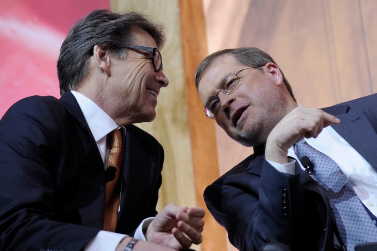 Americans for Tax Reform President Grover Norquist held a rare, on-the-record, invitation-only meeting Wednesday at the Republican National Convention, which included former Texas Gov. Rick Perry. (AP Photo/Susan Walsh)