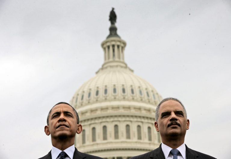 President Obama sits with Attorney General Eric Holder during the 32nd annual the National Peace Officers Memorial Service, Wednesday, May 15, 2013, on Capitol Hill in Washington, honoring law enforcement officers who died in the line of duty. (AP Photo/Pablo Martinez Monsivais)