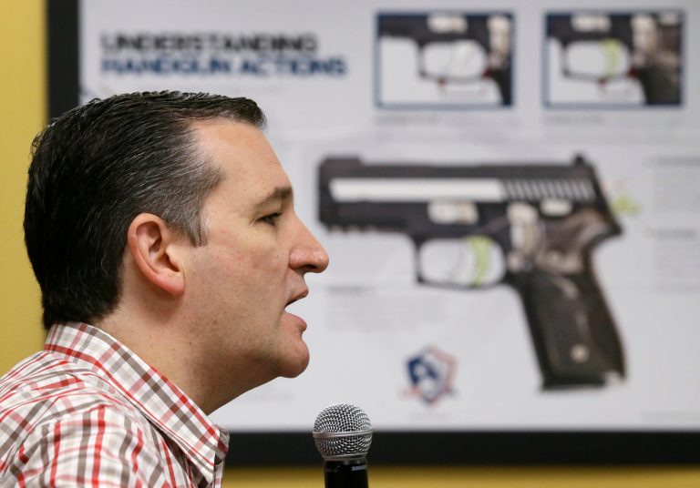 The image of a large gun pointing at the head ofÂ Republican presidential candidate Sen. Ted Cruz, R-Texas, as speaks he during a 