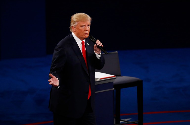 Presidential debate moderator Anderson Cooper asked Donald Trump during the presidential debate Sunday night how repealing Obamacare would ensure that people with pre-existing conditions get coverage, a provision of the law the GOP nominee has supported. (Andrew Harrer/Bloomberg)
