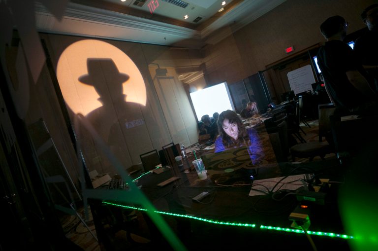 A Black Hat tech associate works in the network operating center during the Black Hat information security conference at Mandalay Bay on Wednesday in Las Vegas. Against a backdrop of cyberattacks that have grown into full-fledged sabotage, Facebook chief security officer Alex Stamos brought a sobering message to hackers and security experts in attendance. (Richard Brian/Las Vegas Review-Journal via AP)