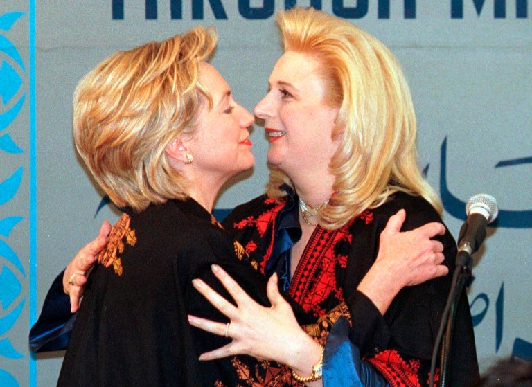 Then-First Lady Hillary Clinton, left, hugs Yasser Arafat's wife Soha Arafat after Clinton pledged U.S. financial aid to refugee projects in Gaza on December 14, 1998. (AP Photo/Laurent Rebours)