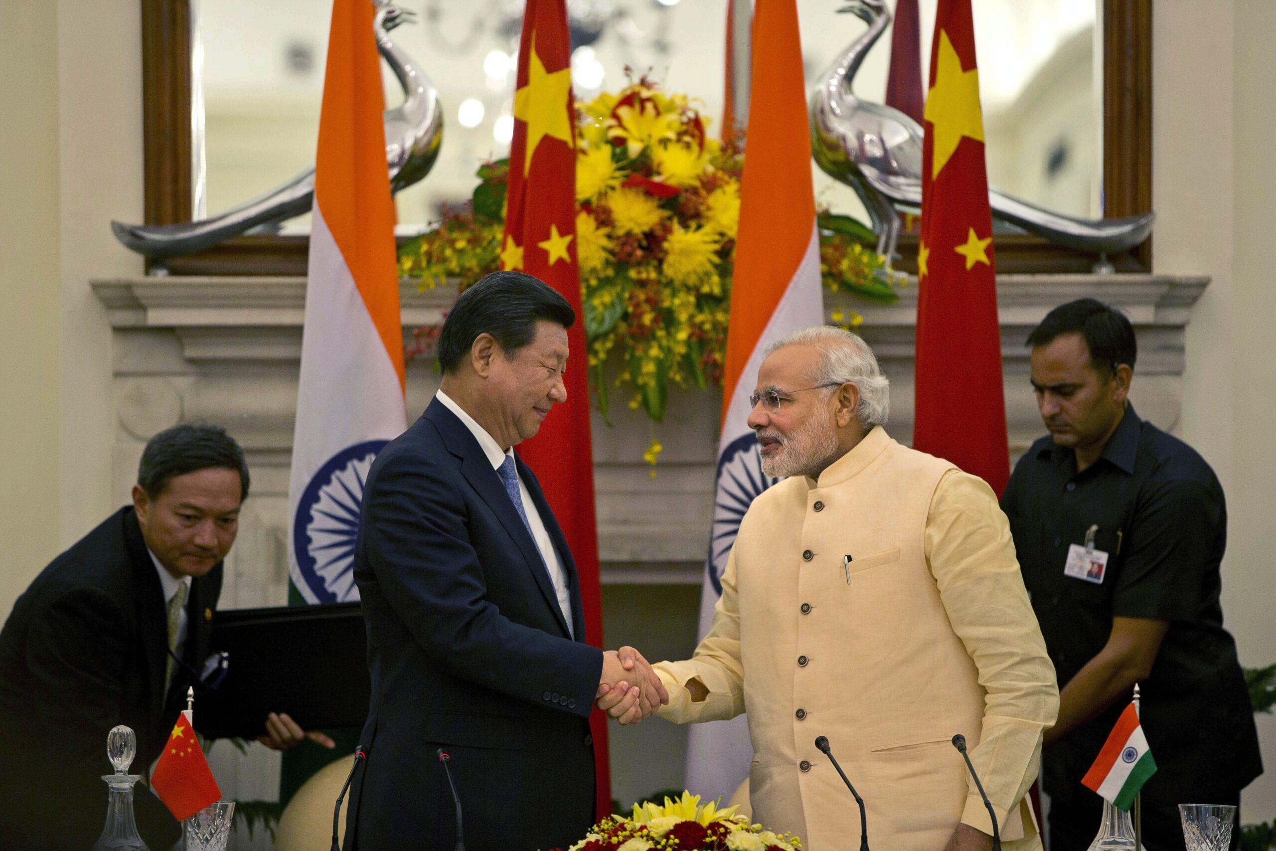 India, China vow cooperation as troops face off