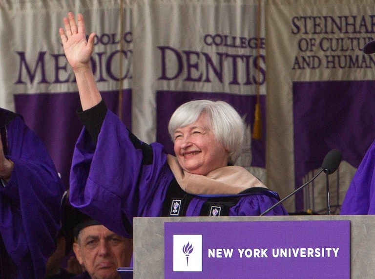 Federal Reserve Chair Janet Yellen waves to the crowd at New York University's commencement ceremony Wednesday, May 21, 2014, at Yankee Stadium in New York.  (AP Photo/Frank Franklin II)