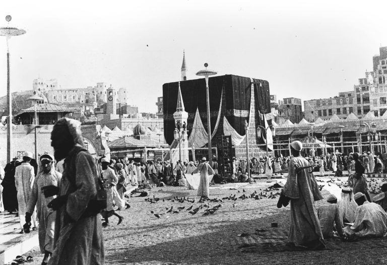 FILE - In this Sept. 7, 1954 file photo, Muslims visit the Kaaba, the Sacred House of Allah, during a pilgrimage to Mecca, Saudi Arabia. As Muslims from around the world stream into Mecca for the annual hajj pilgrimage this week, they come to a city undergoing the biggest transformation in its history. (AP Photo, File)