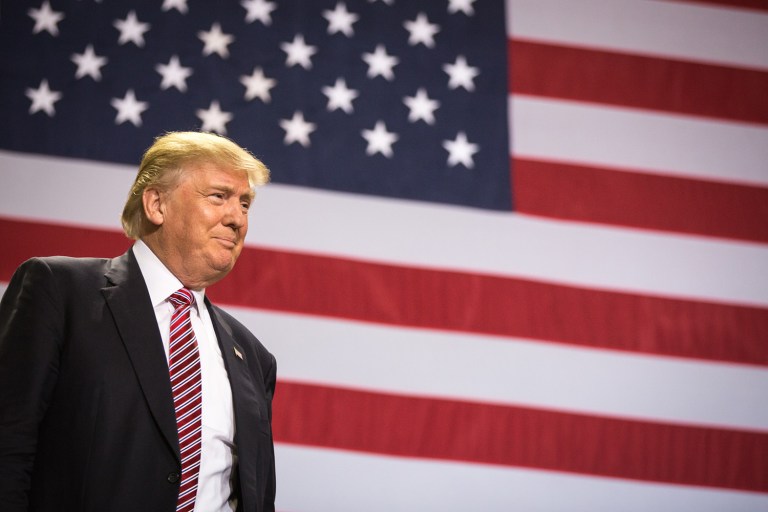 According to a new poll, Donald Trump has closed the gap ever-so-slightly between him and Hillary Clinton. (Loren Elliott/Tampa Bay Times via AP)
