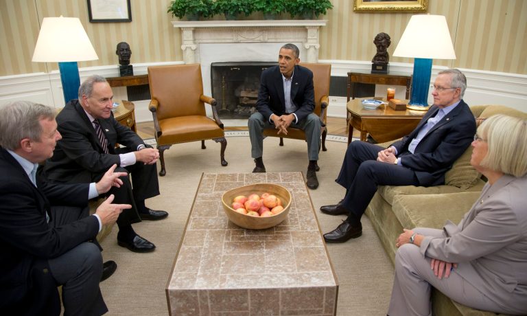 FILE - In this Oct. 12, 2013, file photo, from left, Sen. Dick Durbin, D-Ill., Sen. Charles Schumer, D-N.Y., President Barack Obama, Senate Majority Leader Harry Reid of Nev., Sen. Patty Murray, D-Wash., meet in the Oval Office of the White House in Washington. When Obama delivers his State of the Union address on Jan. 28, 2014, he isn't just setting out his own agenda. He's also delivering an opening salvo in the yearlong fight for control of Congress. Although not explicitly political, the speech will frame an economic argument that Democrats hope will appeal to voters across the country. (AP Photo/Carolyn Kaster, File)