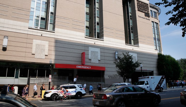 Metropolitan Police cars are parked outside of the emergency entrance at George Washington University Hospital in Washington, Wednesday, June 14, 2017. (AP Photo/Jacquelyn Martin)