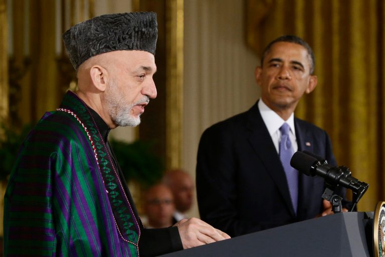FILE - This Jan. 11, 2013 file photo shows President Barack Obama listening as Afghan President Hamid Karzai speaks during a news conference in the East Room at the White House in Washington. President Barack Obama has ordered the Pentagon to plan for a full American withdrawal from Afghanistan by the end of this year should the Afghan government refuse to sign a security agreement with the US the White House said Tuesday. (AP Photo/Charles Dharapak, File)