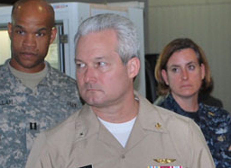 Rear Adm. David Baucom, center, received non-judicial punishment for conduct unbecoming an officer and disorderly conduct/drunkenness, the Navy announced. (U.S. Navy)