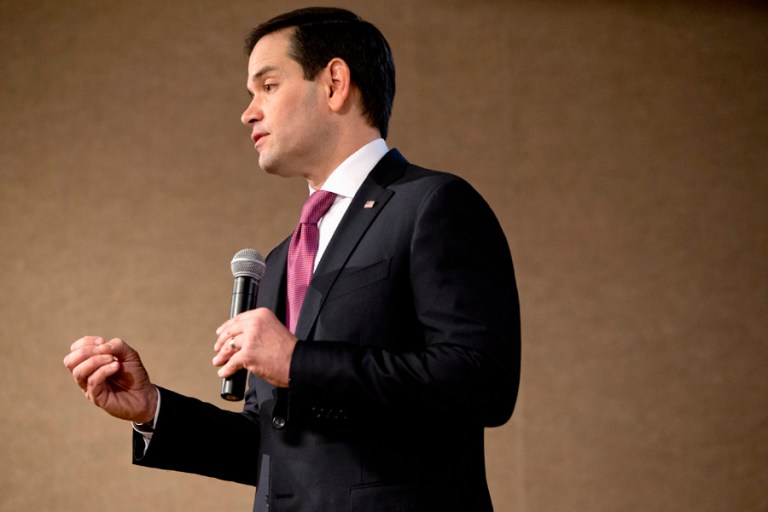 As is typical for the day before an election, Rubio's Monday schedule was packed with campaign stops and venues that were less partisan in nature -- restaurant meet-and-greets, tours of local businesses, capped off by one big overtly political rally in the evening. (AP Photo/Jacquelyn Martin)