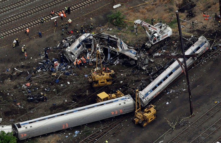 The engineer accelerated to 106 mph as his train went into a sharp curve with a 50 mph speed limit, investigators said at an NTSB hearing convened to pinpoint the cause of the May 12, 2015, tragedy. (AP Photo/Patrick Semansky, File)
