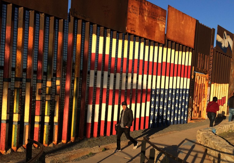 President Trump moved aggressively to tighten the nation's immigration controls Wednesday, signing executive actions to jumpstart construction of his promised U.S.-Mexico border wall. (AP Photo/Julie Watson)
