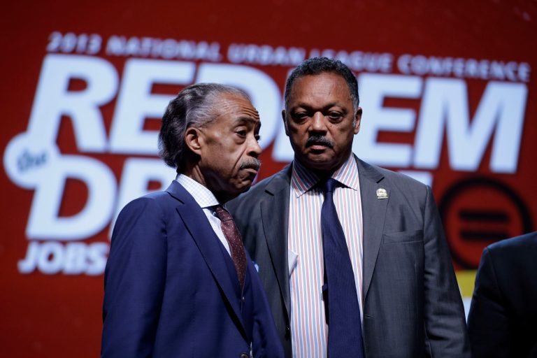 Some are calling for the Rev. Al Sharpton, left, and the Rev. Jesse Jackson the condemn the July 9 beating of a 13-year-old white boy in Florida. (AP Photo/Matt Rourke)