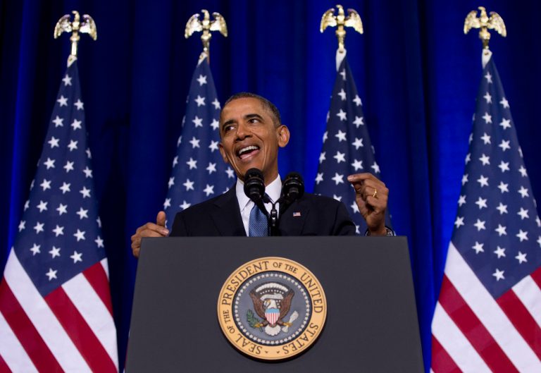 President Barack Obama talks about National Security Agency (NSA)surveillance, Friday, Jan. 17, 2014, at the Justice Department in Washington.Seeking to calm a furor over U.S.  surveillance, the president called for ending the government's control of phone data from -hundreds of millions of Americans and immediately ordered intelligence agencies to get a secretive court's permission before accessing the records.  (AP Photo/Carolyn Kaster)