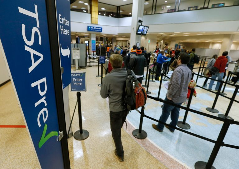 Travel groups are behind third parties' involvement in enrollment because they argue it would lower costs and allow alternative options for registration. (George Frey/Bloomberg)