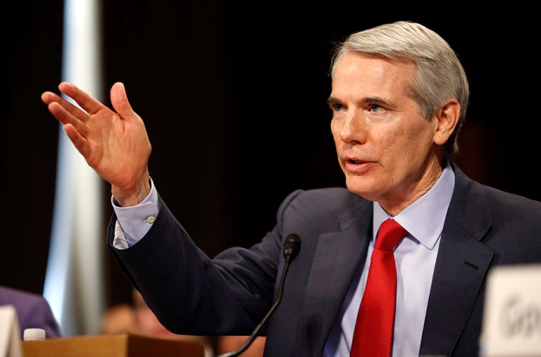Portman's bill would establish an evidence-based opioid and heroin treatment and intervention program, but that's not enough for some Democrats. (AP Photo/Alex Brandon)