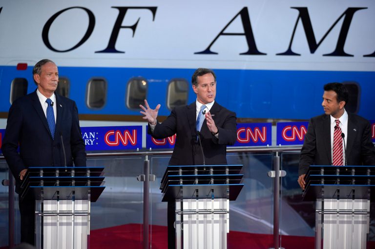 Republican presidential candidates, George Pataki, left, Rick Santorum, center, Bobby Jindal appear during the CNN Republican presidential debate. (AP Photo/Mark J. Terrill)