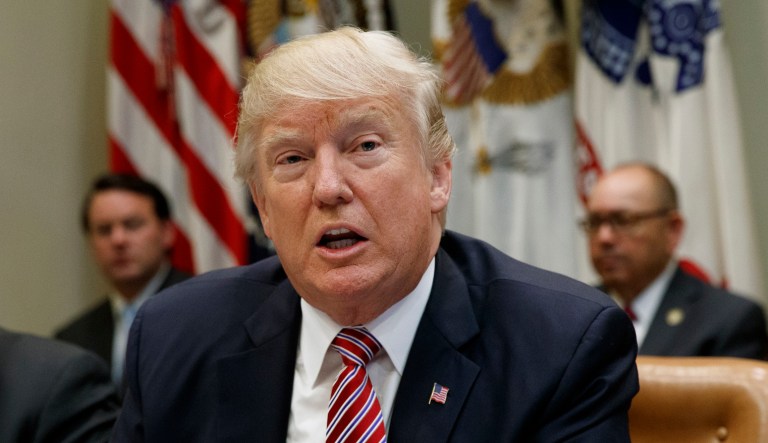 Half the public finds CNN more trustworthy than President Trump, according to a new poll released Tuesday. (AP Photo/Evan Vucci)