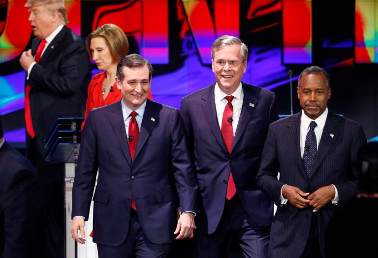 Republican presidential candidates, from left, Donald Trump, Carly Fiorina, Ted Cruz, Jeb Bush, and Ben Carson leave the stage following the CNN Republican presidential debate. (AP Photo/John Locher)