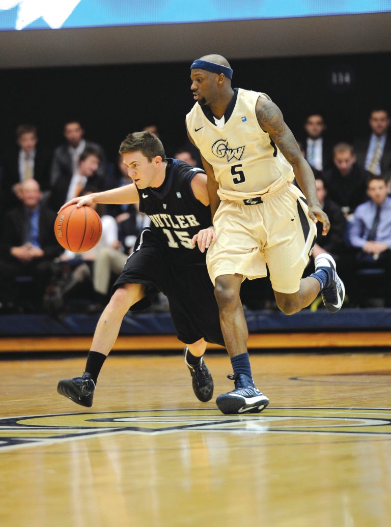 Nick Wass/AP
George Washington senior Bryan Bynes, right, has never played a game at the main site of an Atlantic 10 tournament.