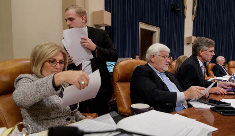 Rep. Diane Black, R-Tenn., joined at right by Rep. Kenny Marchant, R-Texas, looks over amendments as the House Ways and Means Committee continues its debate over the Republican tax reform package, on Capitol Hill in Washington, Wednesday, Nov. 8, 2017. (AP Photo/J. Scott Applewhite)