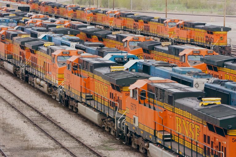 FILE - In this May 5, 2009 file photo, Burlington Northern Santa Fe locomotives are parked in a rail yard in Lincoln, Neb. A unit of the Sheet Metal, Air, Rail and Transportation Workers union has rejected a deal with BNSF that would have allowed one-person crews under certain circumstances. (AP Photo/Nati Harnik, File)