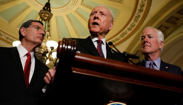 Senate Finance Committee Chairman Orrin Hatch announced that a deal had been struck hours before the conference committee tasked with hammering out the joint bill was set to meet for its first and only public meeting. (Aaron P. Bernstein/Bloomberg)