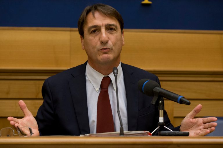Claudio Fava speaks during a news conference, in Rome, Tuesday, Sept. 30, 2014. An Italian lawmaker has decried a secret arrangement in which intelligence agents paid imprisoned top Mafiosi for information during several of the years when Silvio Berlusconi was premier. Claudio Fava, vice president of Parliament's anti-Mafia commission, told reporters Tuesday that magistrates investigating Italy's organized crime syndicates were kept in the dark about the practice, described in a written protocol between the now-defunct intelligence agency Sisde and the national prison administration agency. The practice came to light when Premier Matteo Renzi declassified the document in July. (AP Photo/Andrew Medichini)