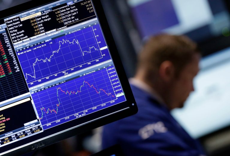 A specialist works at his post on the floor of the New York Stock Exchange Monday, Sept. 29, 2014. The U.S. stock market slid to start the week, following European markets lower. (AP Photo/Richard Drew)