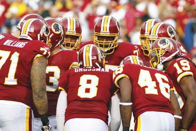 J. David Ake/AP
Rex Grossman and the offense scored 24 points in Sunday's loss, representing the highest total for the unit this season.
