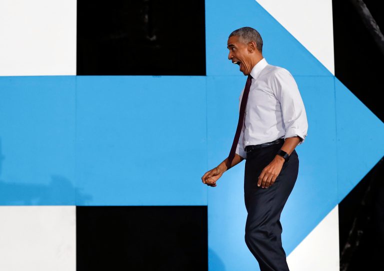 President Barack Obama reacts to seeing supporters as he walks on stage at PNC Music Pavilion in Charlotte, N.C., Friday, Nov. 4, 2016 during a campaign rally for Democratic presidential candidate Hillary Clinton. (AP Photo/Pablo Martinez Monsivais)