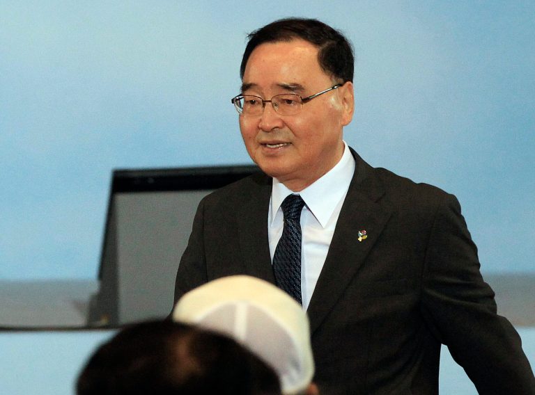 In this Wednesday, June 25, 2014, South Korean Prime Minister Chung Hong-won arrives to attend a ceremony to mark the 64rd anniversary of the outbreak of the Korean War in Seoul, South Korea. South Koreaâs president Park Geun-hye has decided to retain the current prime minister after her two consecutive choices for the job voluntarily abandoned nominations over past controversial behaviors on Thursday, June 26, 2014. (AP Photo/Ahn Young-joon)