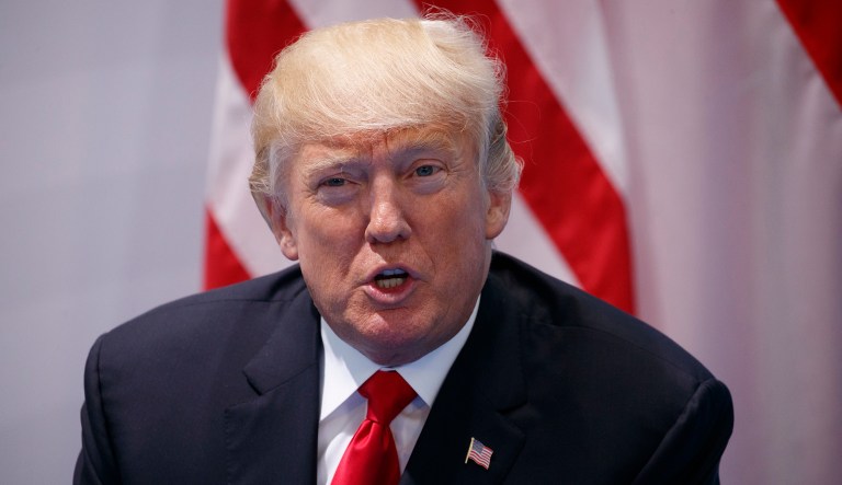 The Knight First Amendment Institute is taking issue with Trump blocking various Twitter users from viewing his tweets. (AP Photo/Evan Vucci)