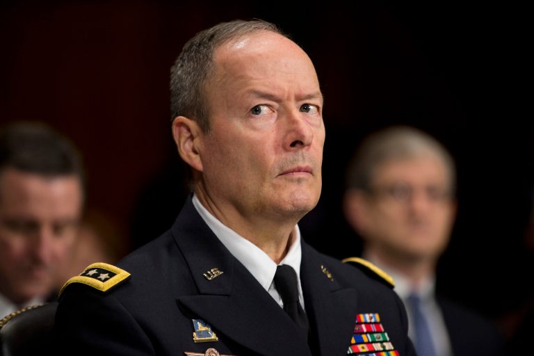   National Security Agency Director Gen. Keith Alexander pauses while testifying on Capitol Hill in Washington, Wednesday, Oct. 2, 2013, before the Senate Judiciary Committee oversight hearing on the Foreign Intelligence Surveillance Act. U.S. intelligence officials say the government shutdown is seriously damaging the intelligence communityâs ability to guard against threats. (AP Photo/ Evan Vucci)  